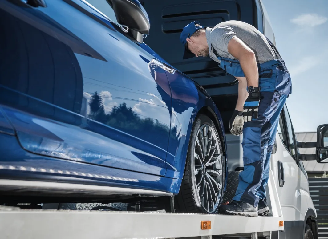 Charlotte local tow truck loading vehicle